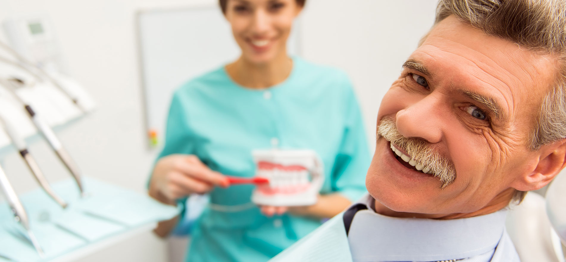 Man smiling at the dental